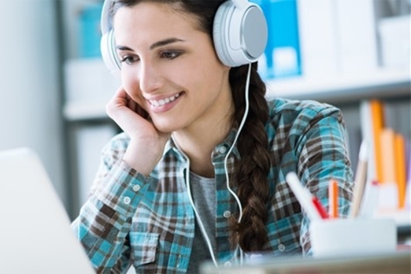 woman looking at computer