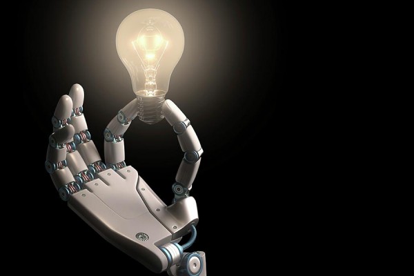 robot hand holding lightbulb