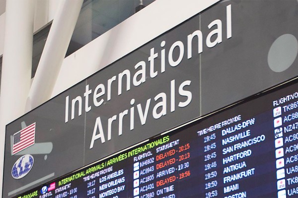 airport sign reading &quot;International arrivals&quot;