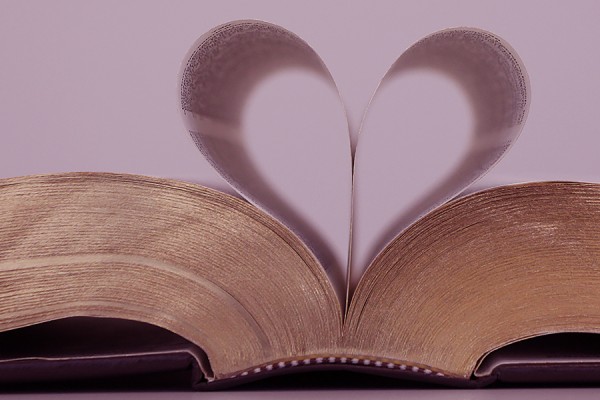book with pages folded to form heart shape