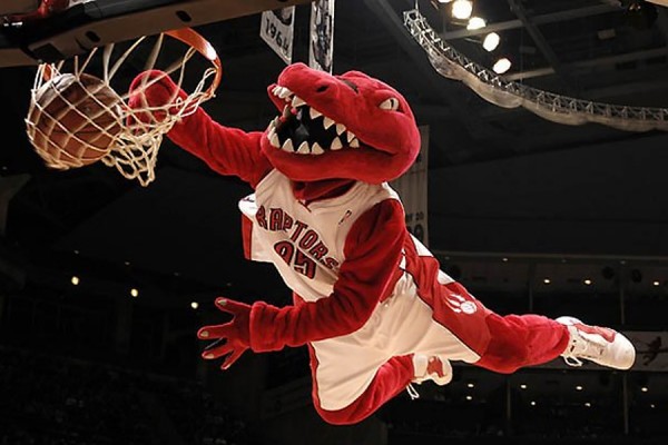 Toronto Raptors mascot slam-dunking a basketball