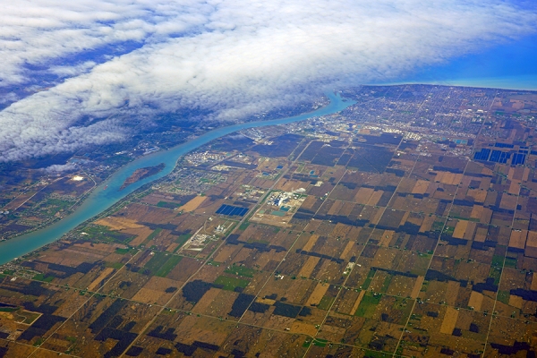 aerial photo of Detroit River and U.S. and Canadian shores