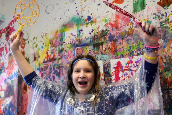 young person happy in splatter room