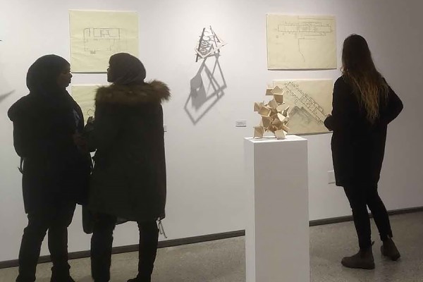 students looking at exhibits