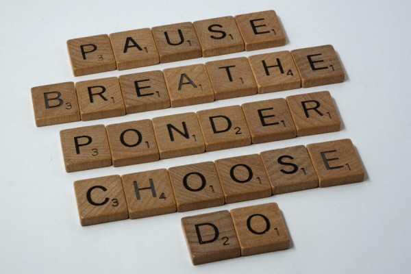 Scrabble tiles spelling out inspirational phrases