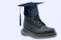 boot wearing academic mortarboard