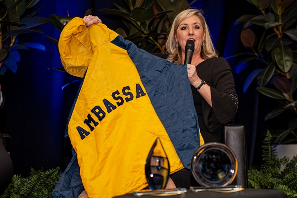 Beth Ann Prince proudly displays her vintage Student Ambassador jacket