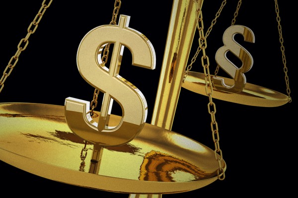 scale of justice weighing dollar signs