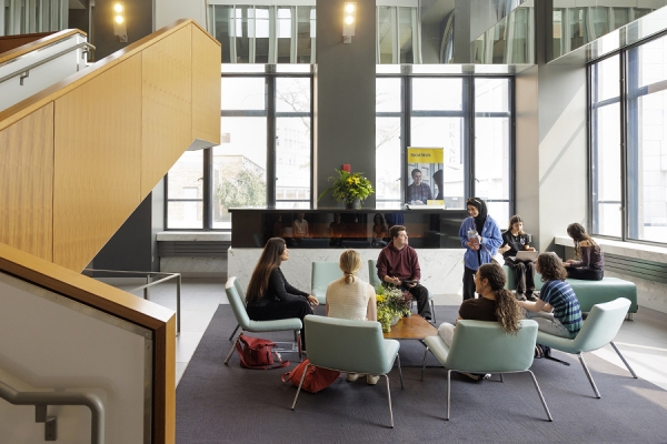 gathering in lobby of school of social work