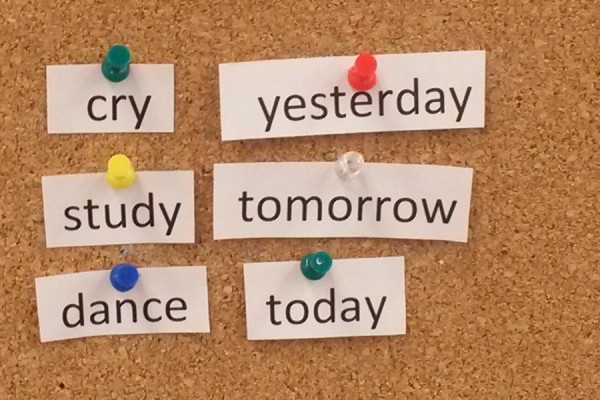 words pinned to cork board to form poem