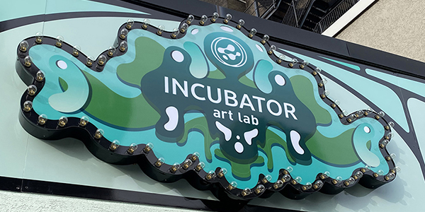 Incubator art lab sign