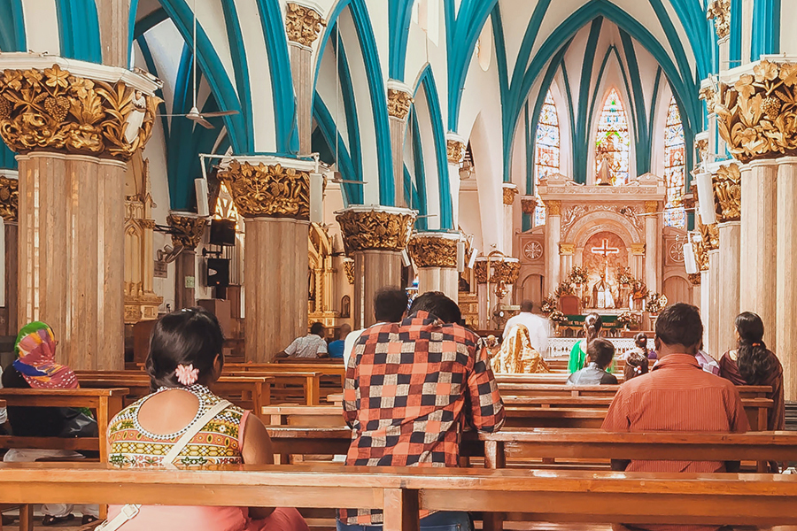 worshippers praying in St. Mary's Basilica in Bangalore