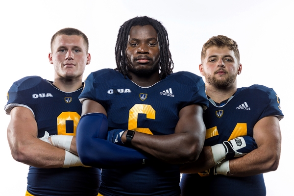 Football players standing together.