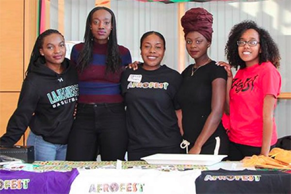 Volunteers staff a booth