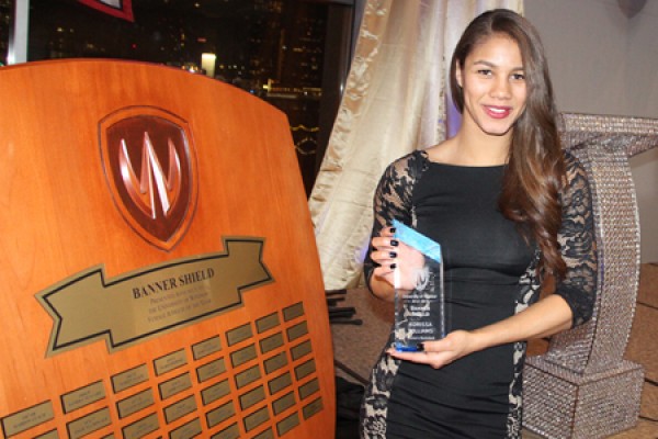 Korissa Williams celebrates her Banner Shield award as Lancer female athlete of the year.