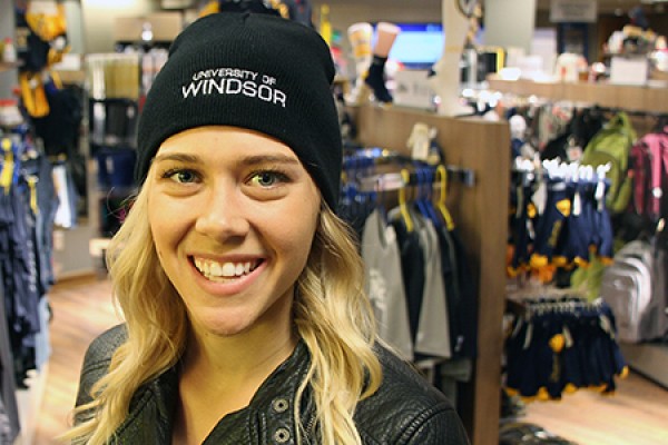 Fourth-year sport management major Sarah Racinsky models a UWindsor toque.