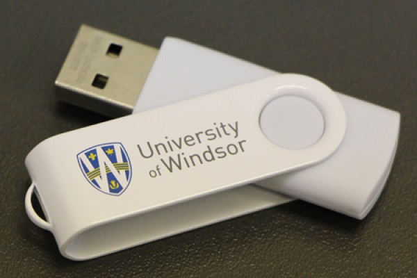 USB flash drive imprinted with the UWindsor logo