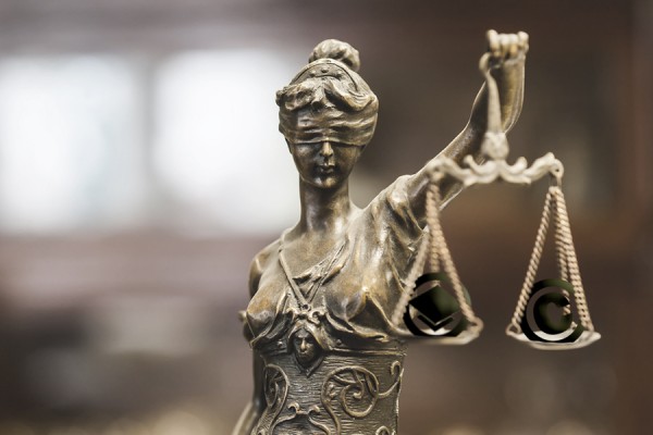 scales of justice balancing copyright and academic freedom