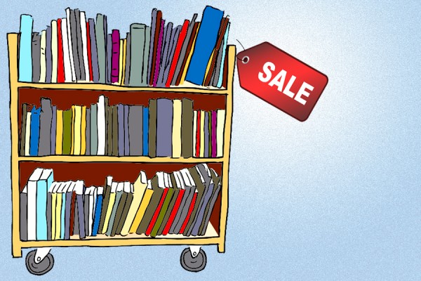 Book sale cart with sign