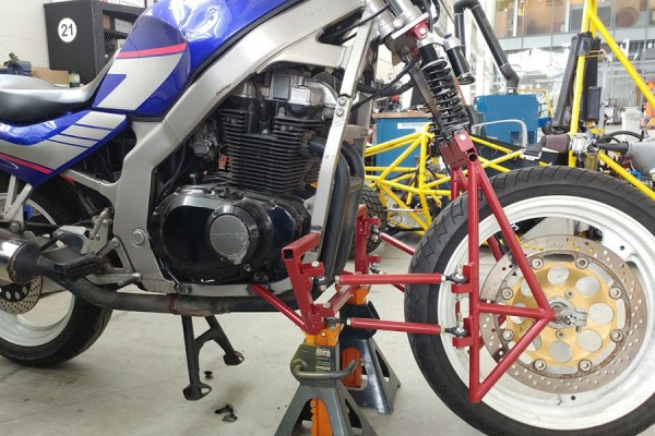 multilink design of front suspension for motorcycles
