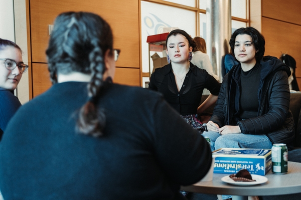 young Indigenous women converse in Turtle Island Centre