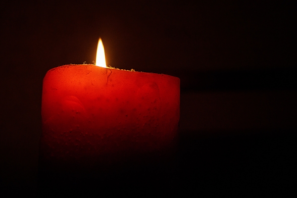 candle burning in dark
