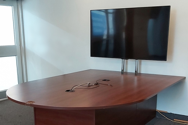 conference table with monitor