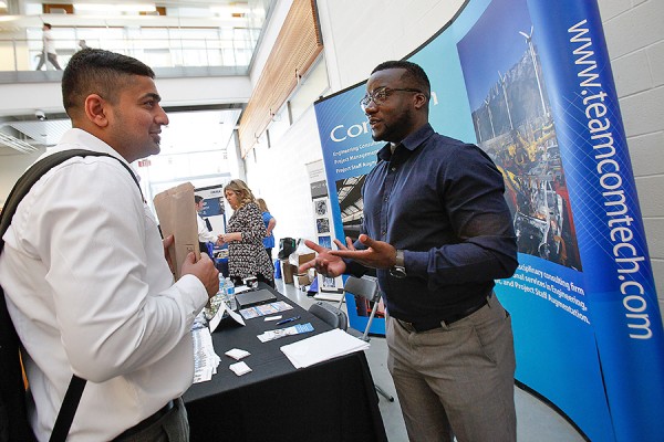 students meeting with potential employers