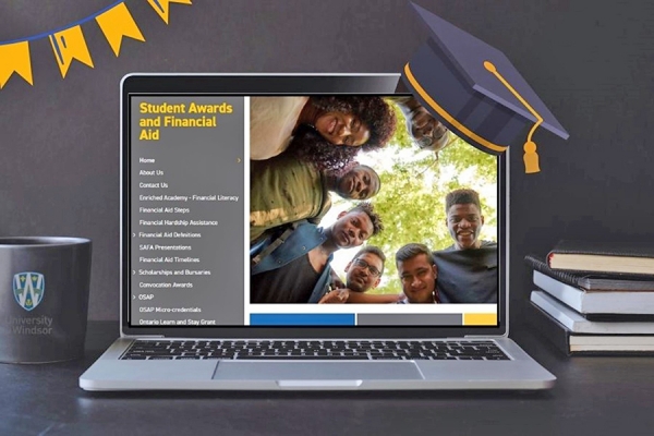 laptop computer displaying awards webpage