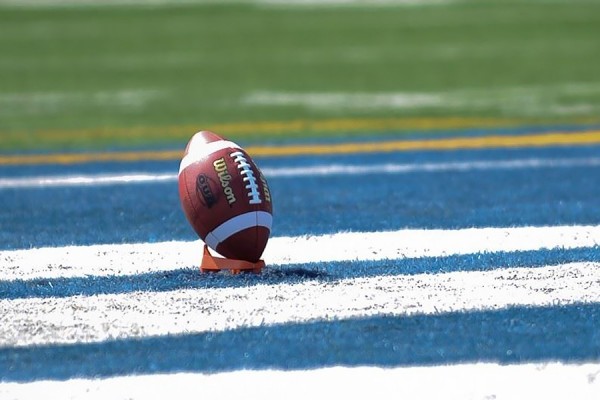 Football on kick-off tee