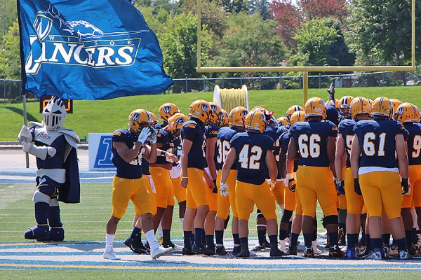 Lancer football players