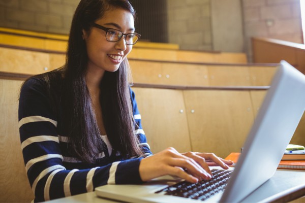 student logging on to orientation program