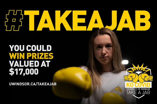 woman wearing boxing gloves titled "Take a Jab"