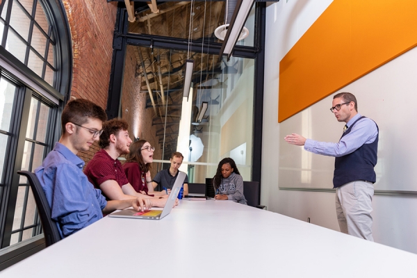students in seminar with professor