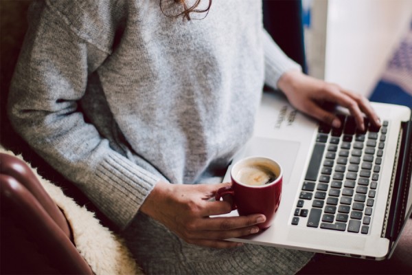 person consulting laptop computer