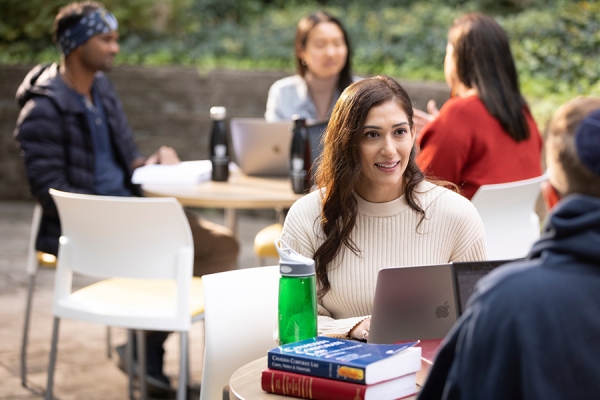 students sitting outdoors