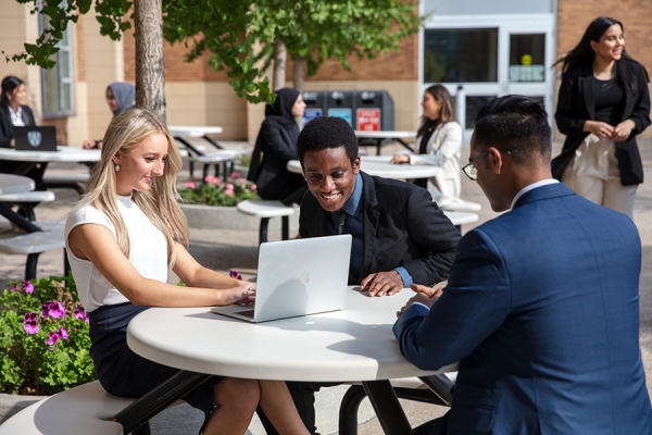 students sharing table