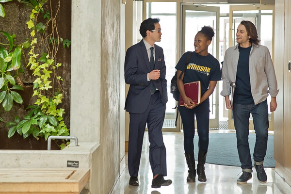 students consulting professor