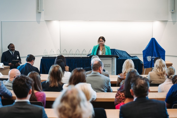 Reem Bahdi at podium in Moot Court