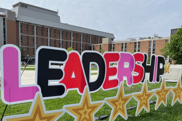 sign spelling out Leadership