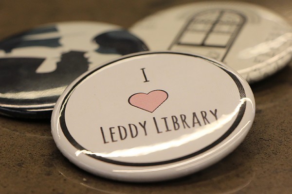 buttons, including one that says &quot;I love Leddy Library&quot;