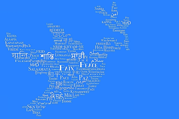dove containing the word Peace in many languages