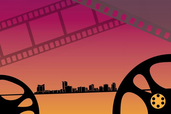 film reels silhouetted against Windsor skyline