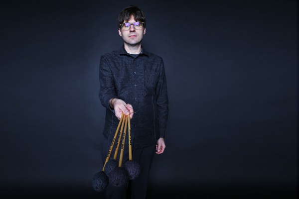 Nicholas Papador holding percussion mallets