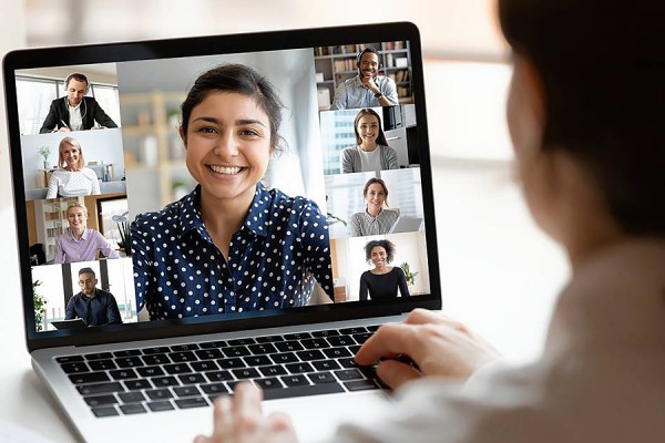 woman engaging with laptop