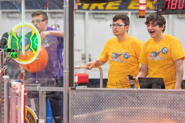 Members of Catholic Central High School’s Electric Comets robotics team compete in the FIRST Robotics Competition at the St. Denis Centre on Friday, March 29.