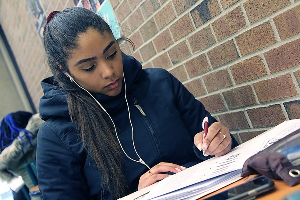 Shelby Armstrong studying in Leddy Library.