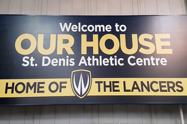 Sign reading &quot;Our House, home of the Lancers&quot;