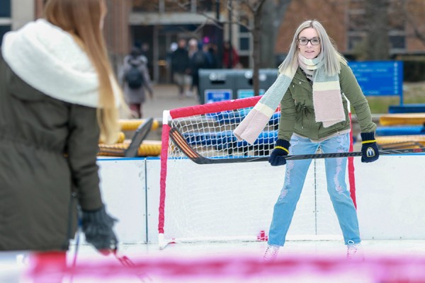 students playing hockey