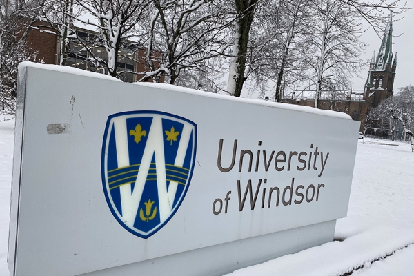 snow-covered sign